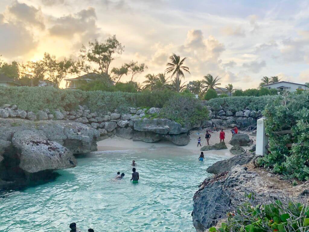 Shark hole beach barbados at sunset