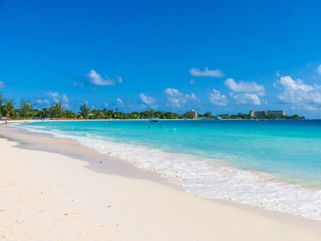Beautiful Carlisle Bay Barbados with two hotels in the background
