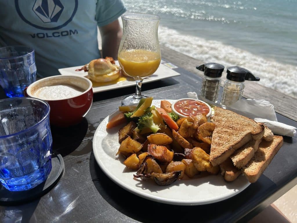 Breakfast plate with a sea view at Surfer's Cafe Barbados